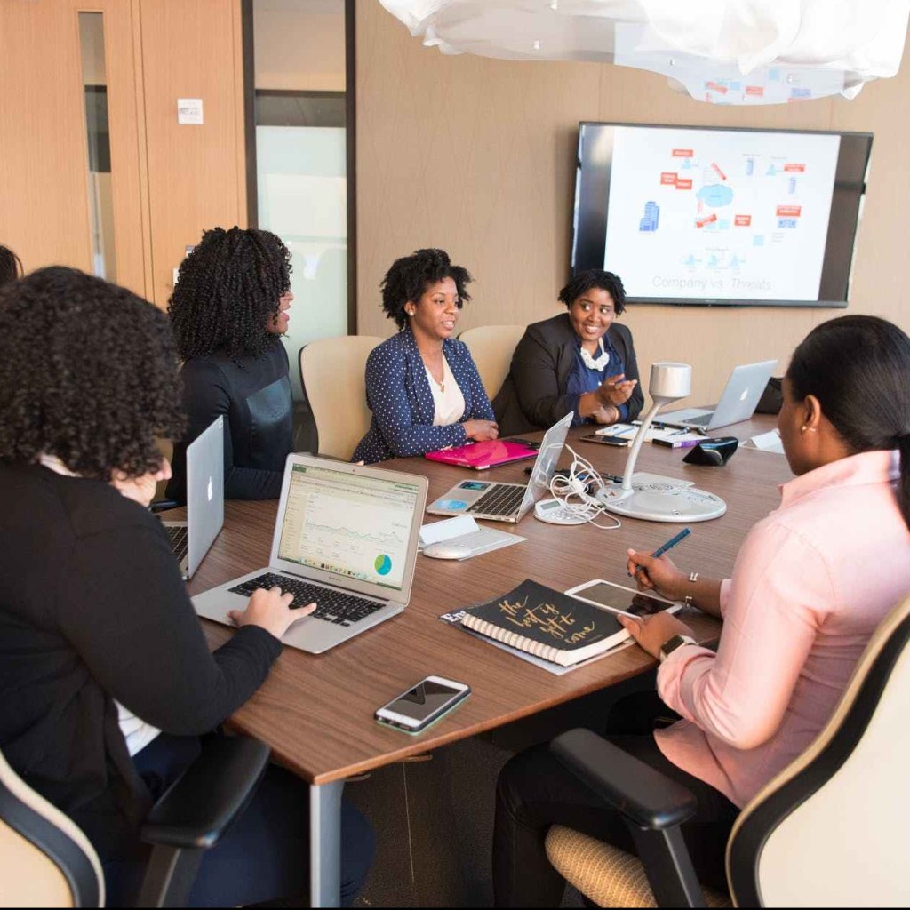 black woman in a boardroom